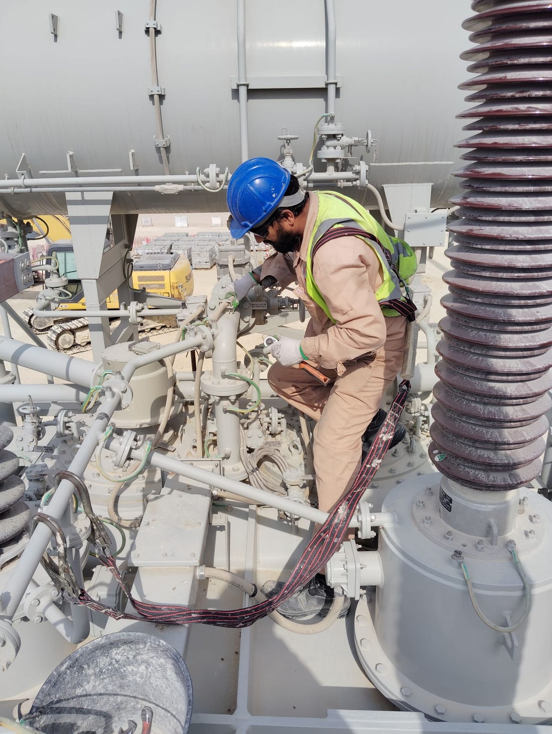Engineer conducting a systematic inspection of equipment at an industrial site - the methodical on-site assessment that forms the core of an electrical safety audit in Chh. Sambhajinagar (Aurangabad)