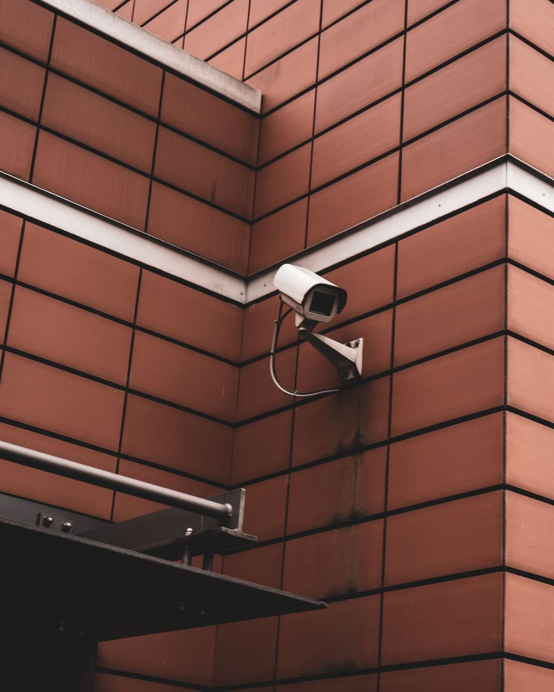 CCTV security camera mounted on exterior wall of a residential building - home CCTV installation guide by Shaats Electrical, Chh. Sambhajinagar (Aurangabad)