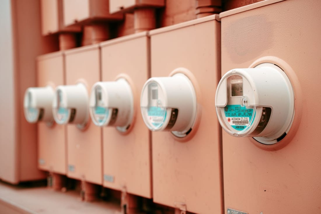 Industrial energy meters showing kWh and kVARh readings - the MSEDCL bill base from which power factor and reactive penalty get calculated