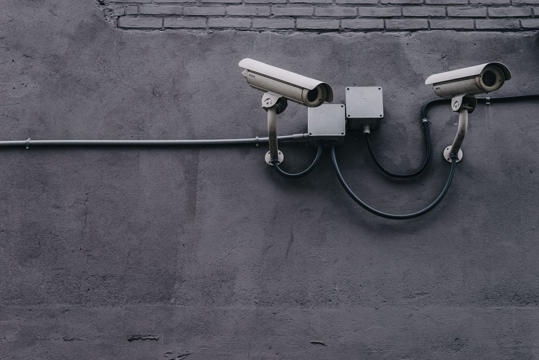 Multiple CCTV cameras mounted on a building exterior wall showing the completed installation - security camera systems installed by Shaats Electrical in Chh. Sambhajinagar